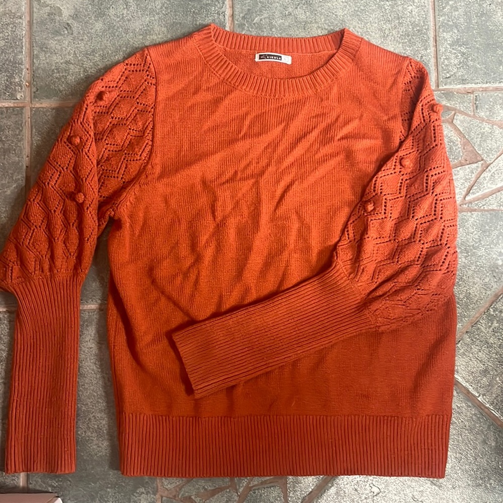 Orange sweater. Large. Detailed sleeves.
